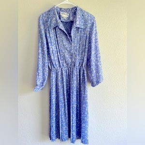 Vintage, periwinkle dress with floral detail.
